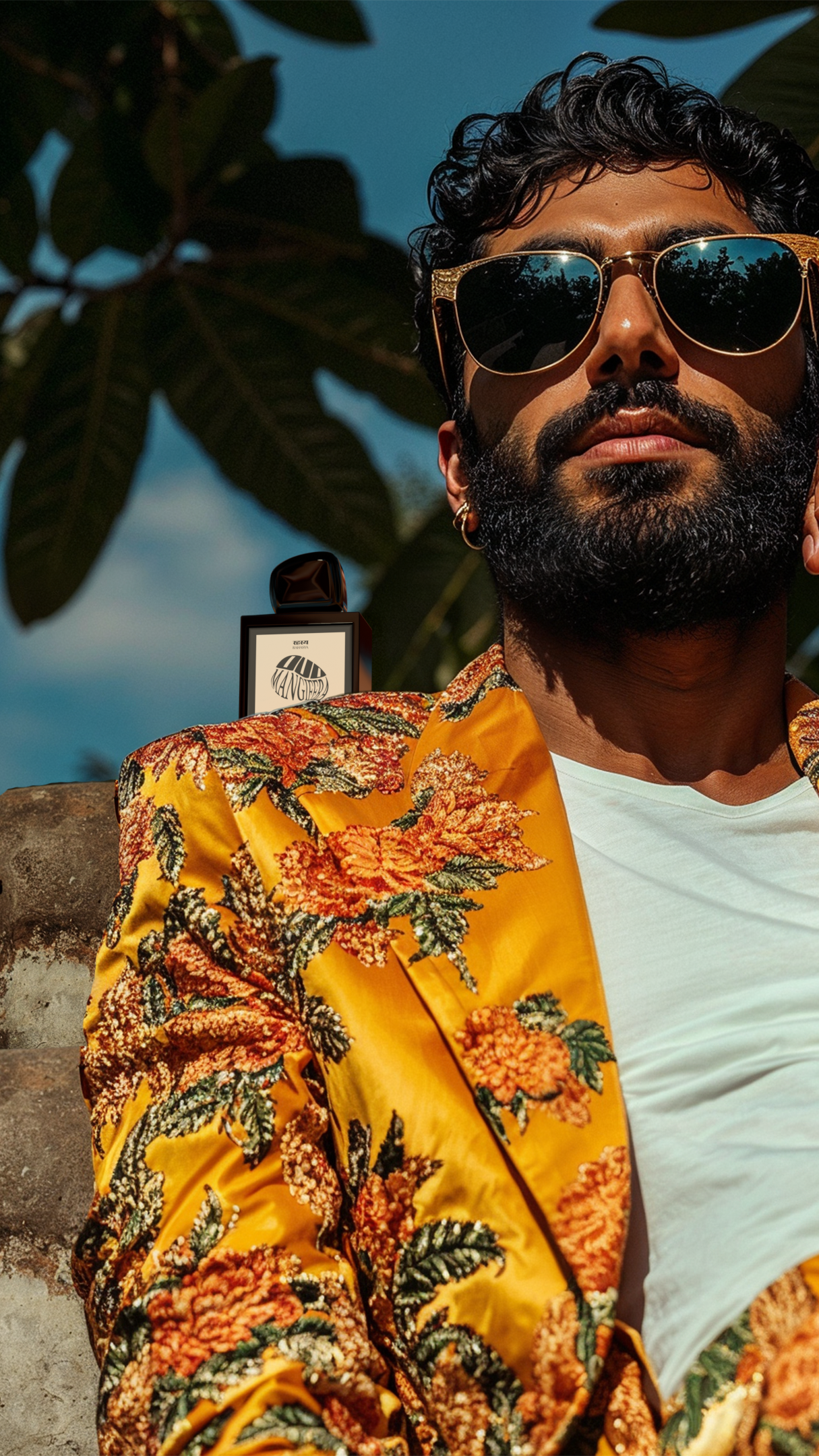 Oud Mangifera Rahasya fragrances model wearing sunglasses and looking out into the distance on a summer day in India